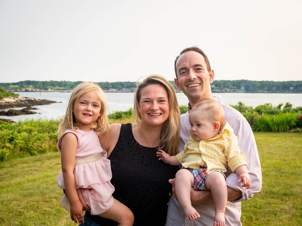 Dr. Daniel Coleman with his wife and children standing outside