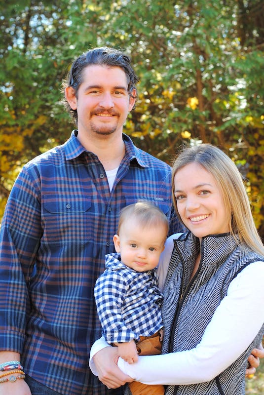 Dr Allison Hopkinson and her family standing outside