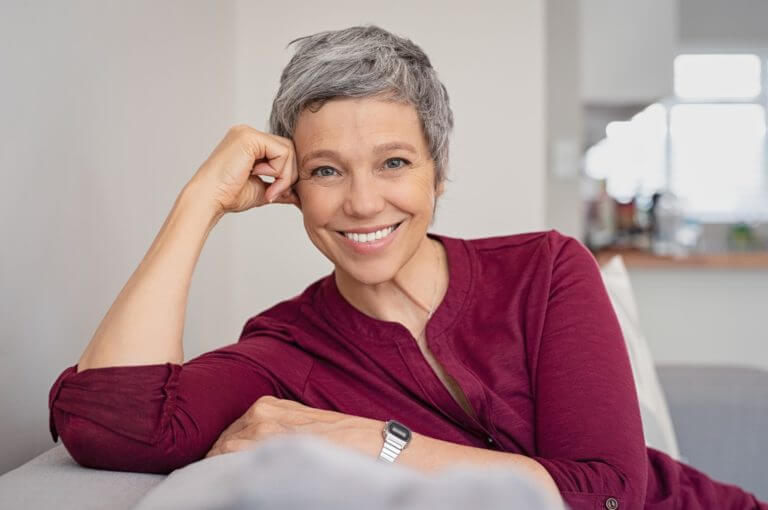 An older woman smiling